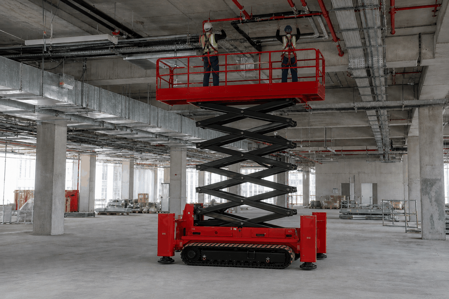 Tracked large-deck scissor lift supporting indoor construction work